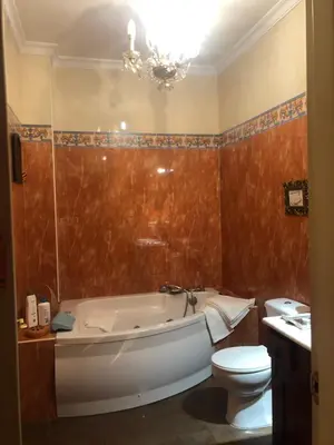 Un baño de Apartamento en Pleno Centro De Marchena 3 dormitorios 3 baños privados