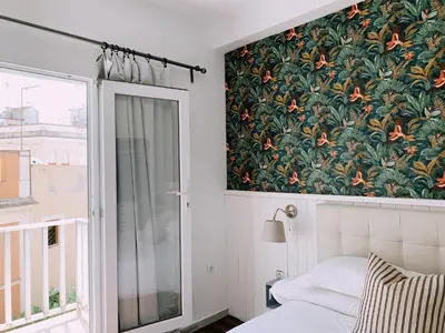 Cama o camas de una habitación en Boutike Guesthouse