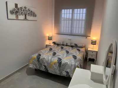 Cama o camas de una habitación en ALFAROS HOME