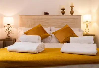 Cama o camas de una habitación en La Judería del Buen Viaje