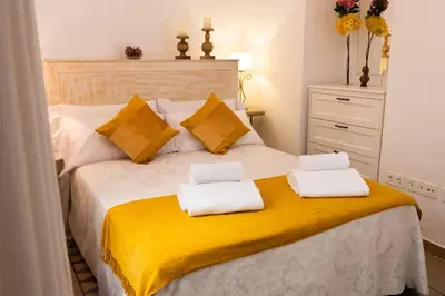 Cama o camas de una habitación en La Judería del Buen Viaje
