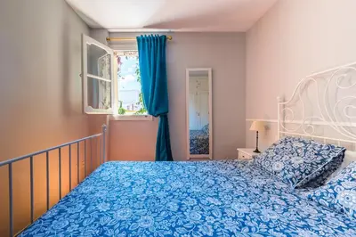 Cama o camas de una habitación en Novalia Home Suite 14
