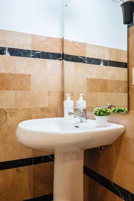Un baño de Novalia Home Suite 14