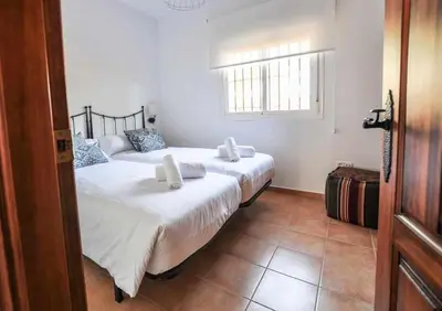 Cama o camas de una habitación en Paredones Casa Rural Caminito del Rey