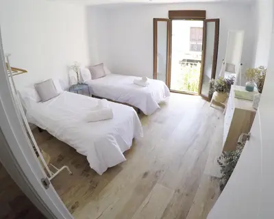 Cama o camas de una habitación en Urban Chic Center Santa Marina