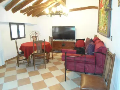 Una televisión o centro de entretenimiento en Casa de Los Albas, 6p