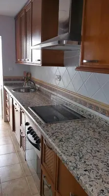 Una cocina o zona de cocina en SAUCES - PARKING GRATIS - CLIMATIZADO