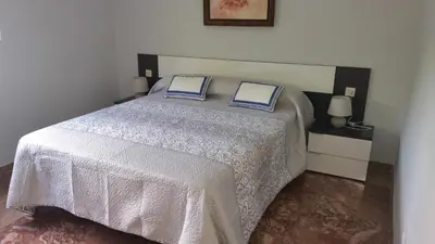 Cama o camas de una habitación en SAUCES - PARKING GRATIS - CLIMATIZADO