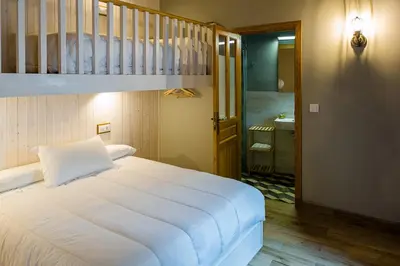 Cama o camas de una habitación en Hospedium Hotel El Nido de Alcudia Suites