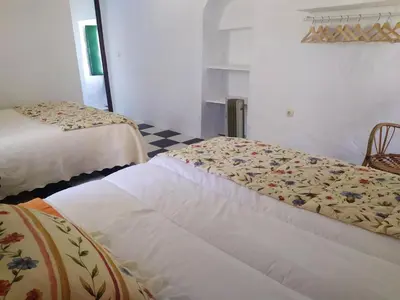 Cama o camas de una habitación en Charming house in Estepa, mountain view