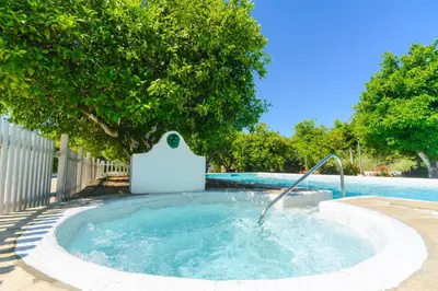 Piscina en o cerca de Huerta la Pimentada