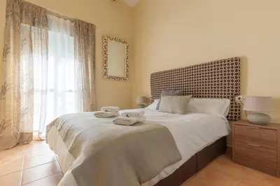 Cama o camas de una habitación en Sevilla Blossom Elegant and bright 2 Rooms - 4PX