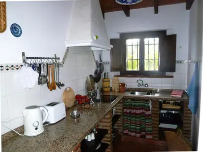 Una cocina o zona de cocina en Guest house in a traditional Andalusian country estate