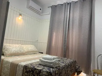 Cama o camas de una habitación en Hostal Alcobia