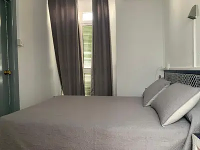 Cama o camas de una habitación en Hostal Alcobia