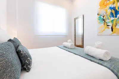 Cama o camas de una habitación en Nine O'Clock Metrosol