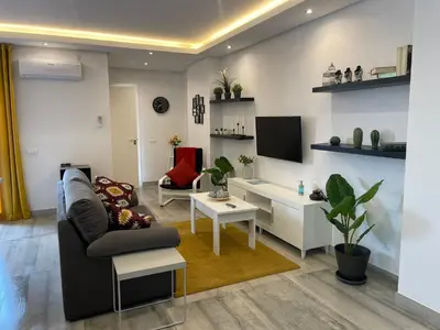 Una televisión o centro de entretenimiento en Apartamentos Cantarería, Azahar