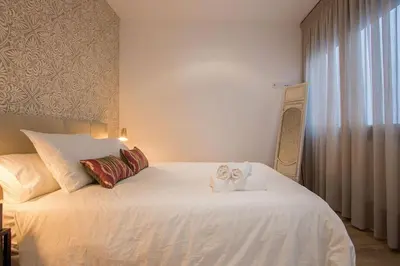 Cama o camas de una habitación en Armenta Deluxe Suite by Valcambre