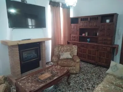 Una televisión o centro de entretenimiento en Casa de Los Albas 4p