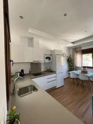 Una cocina o zona de cocina en Apartamentos Cantarería, Jazmín.