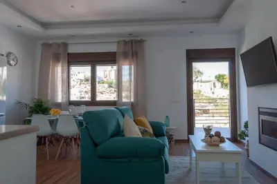 Una televisión o centro de entretenimiento en Apartamentos Cantarería, Jazmín.