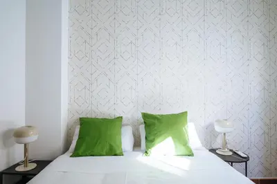 Cama o camas de una habitación en HomeySeville-Lovely Duplex at Santa Cruz 10 pax, Parking Optional