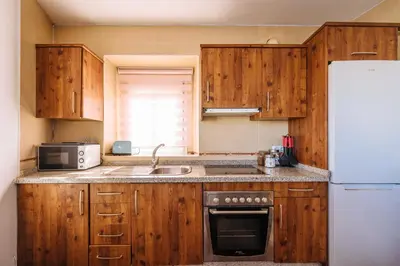 Una cocina o zona de cocina en HomeySeville-Lovely Duplex at Santa Cruz 10 pax, Parking Optional