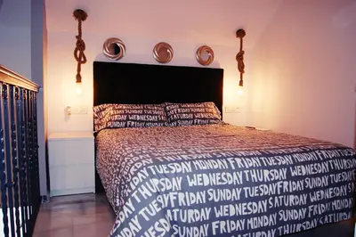 Cama o camas de una habitación en Fabuloso Loft en Centro Histórico de Córdoba con Parking bajo reserva Tendillas Mezquita-Catedral