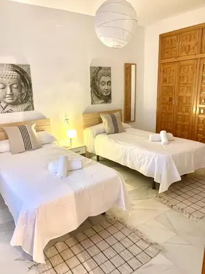 Cama o camas de una habitación en 1.1 Apartamentos Arguiñan