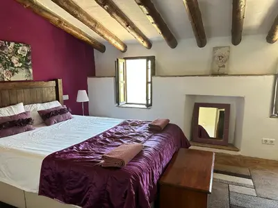 Cama o camas de una habitación en Cortijo Cuscurro