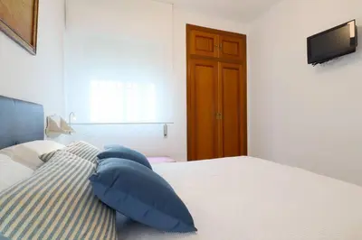 Cama o camas de una habitación en Apartamento Centrum Córdoba con Parking