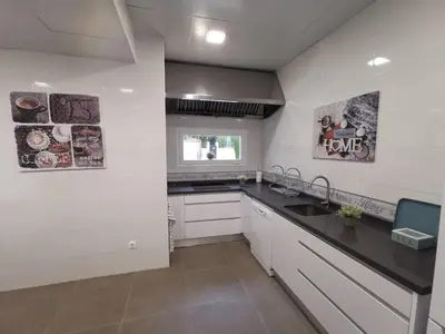 Una cocina o zona de cocina en Casa Orilla el Lago