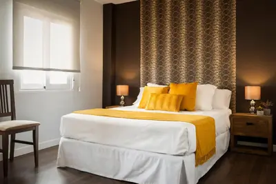 Cama o camas de una habitación en Viviendas con Fines Turísticos 