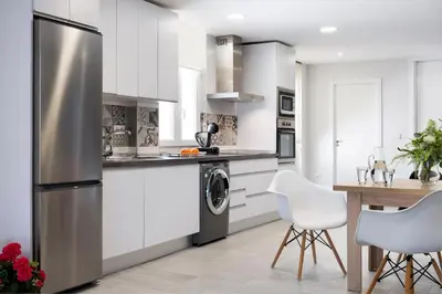 Una cocina o zona de cocina en Viviendas con Fines Turísticos 