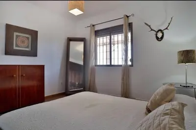Cama o camas de una habitación en Finca la cigarra