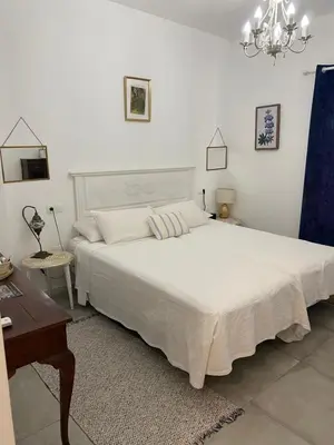 Cama o camas de una habitación en El nido del Chorro