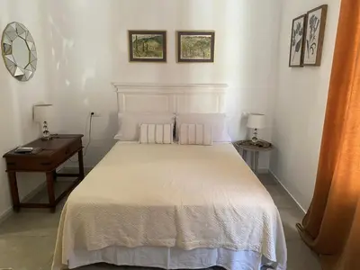 Cama o camas de una habitación en El nido del Chorro
