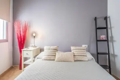 Cama o camas de una habitación en APARTAMENTO PASAJE VALVANERA