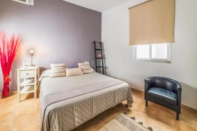 Cama o camas de una habitación en APARTAMENTO PASAJE VALVANERA