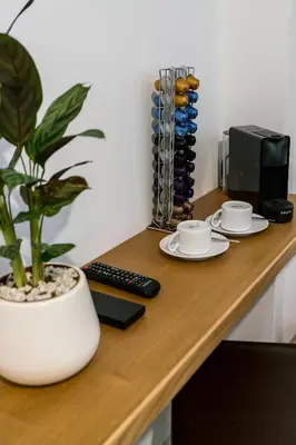 Una televisión o centro de entretenimiento en Unique House - Private SPA&Pool -StayInSeville