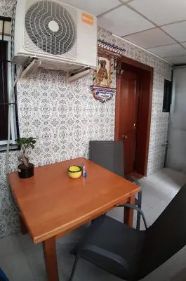 Zona de estar de Fresh & Clean Room Sevilla