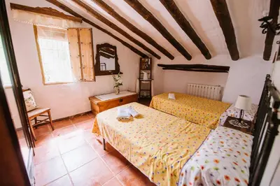 Cama o camas de una habitación en Cortijo Rural Majolero