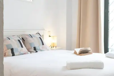 Cama o camas de una habitación en Alohamundi San Esteban