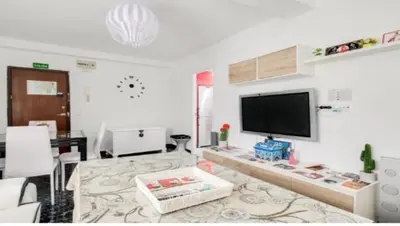 Una televisión o centro de entretenimiento en Apartamento San Antón