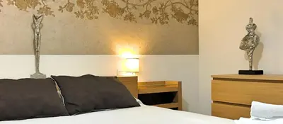Cama o camas de una habitación en FUENTE REDONDA EN BAEZA