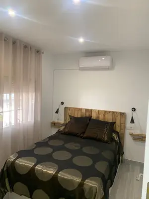 Cama o camas de una habitación en ALOJAMIENTO CERRO DEL CABEZO