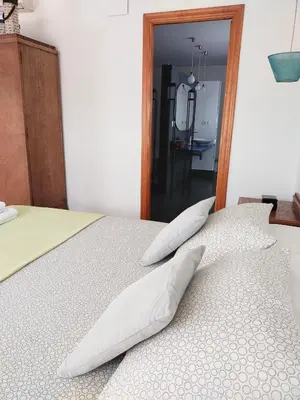 Cama o camas de una habitación en Preciosa casa grande con patio en Sevilla 8PAX
