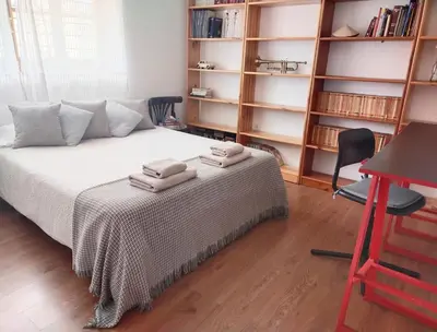 Cama o camas de una habitación en Preciosa casa grande con patio en Sevilla 8PAX