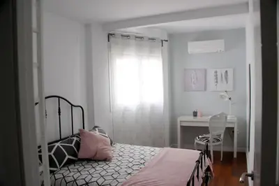 Cama o camas de una habitación en Muro Center