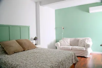 Cama o camas de una habitación en Muro Center